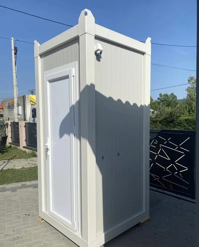White single-stall luxury restroom cabin