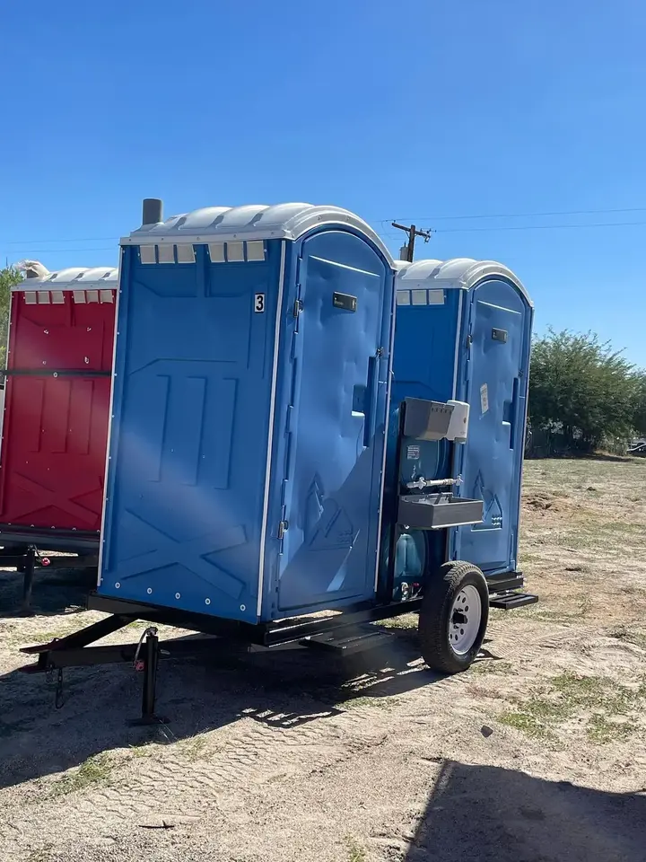 Portable toilets loaded on a delivery trailer
